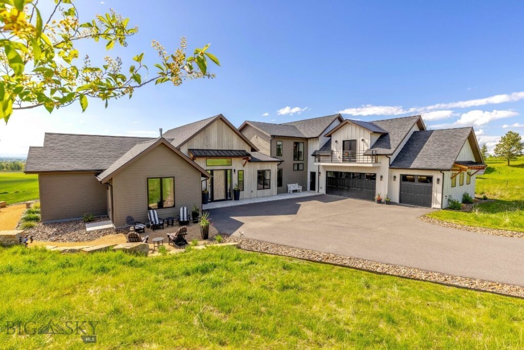 Luxury suburban home with a landscaped front yard in Bozeman